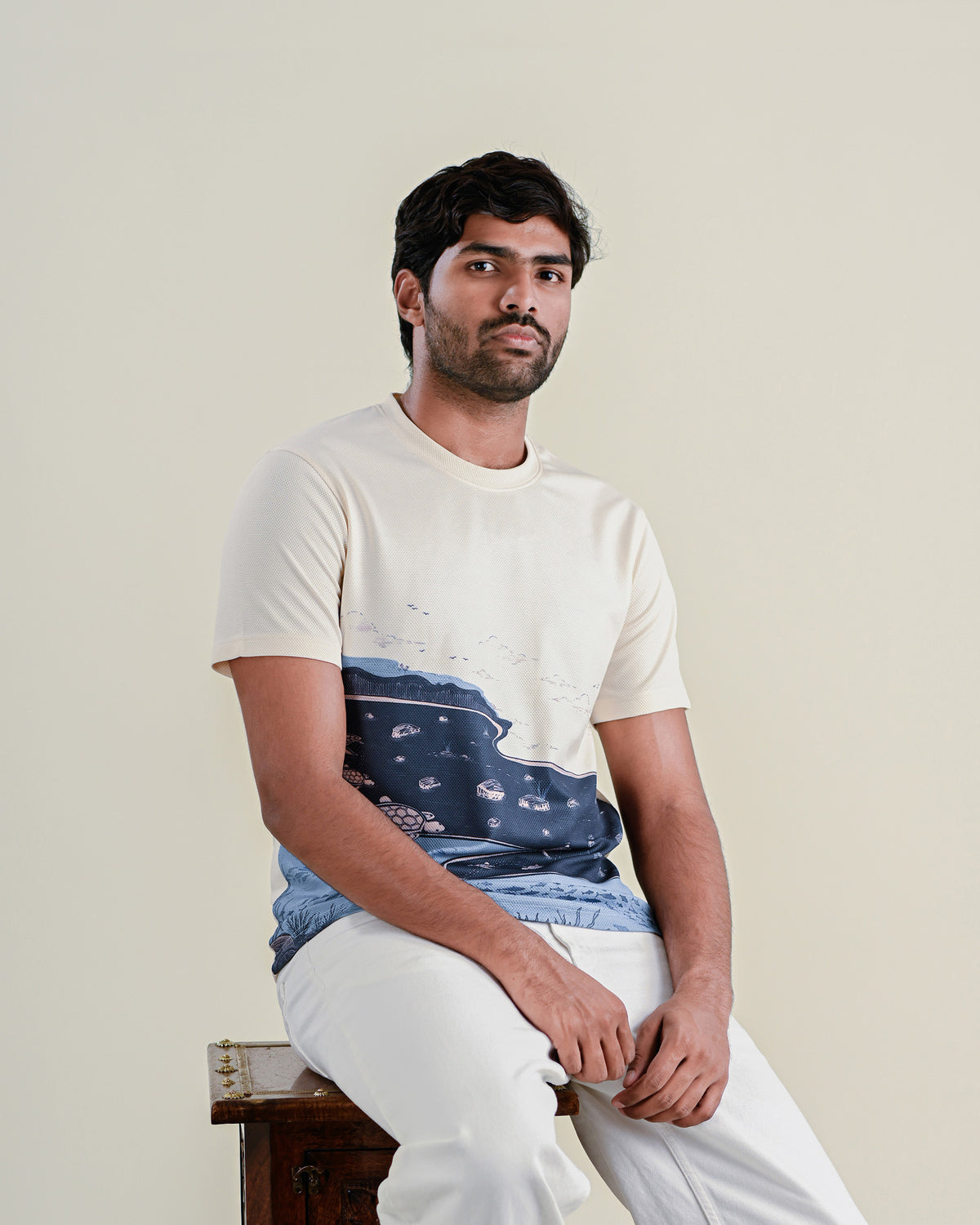 The Makara Tee by RUENCE with the shore print, worn front view.