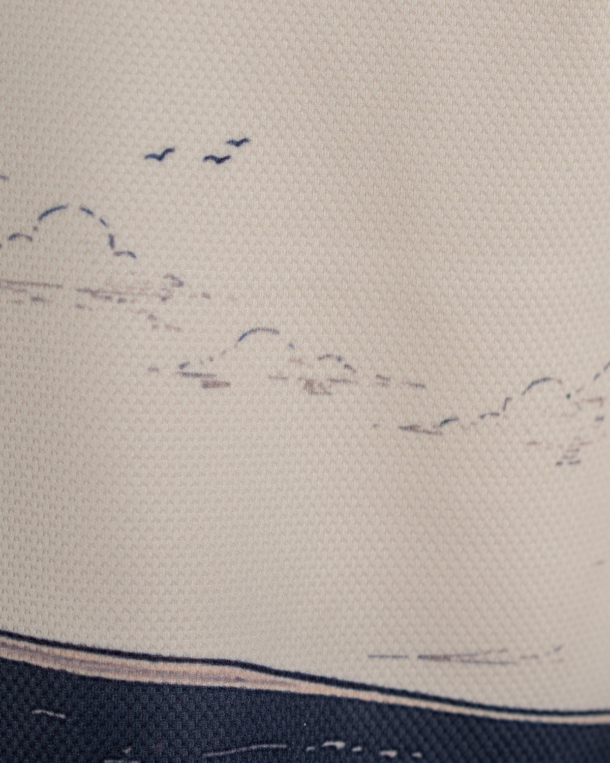 Close view of the Makara Tee Print in lunar knit.