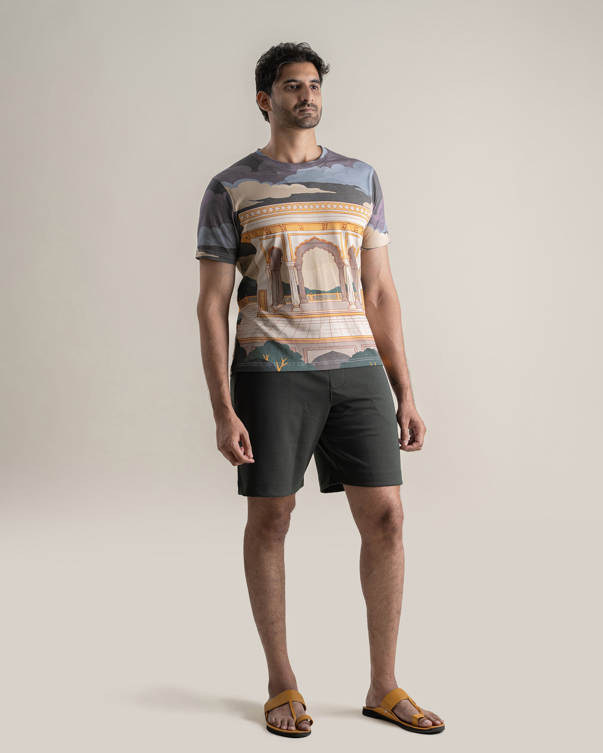 Full length view of the Megh Malhar T Shirt worn with shorts.