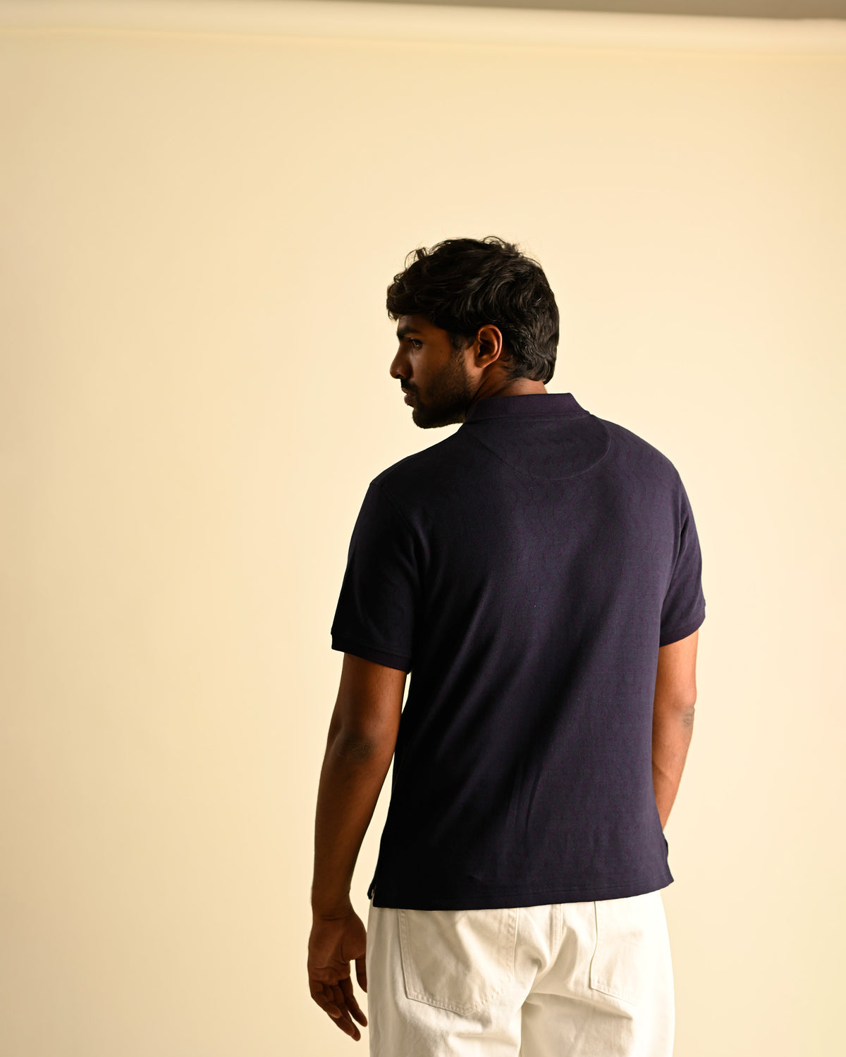 Back view of the Moiré Polo in Evening Blue
