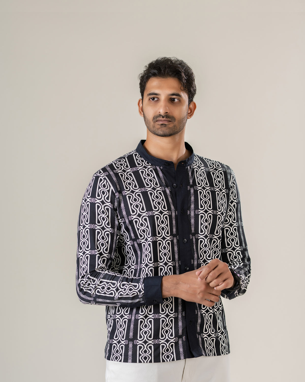 The Mousson Shirt by RUENCE in Midnight mandarin collar, worn front view.
