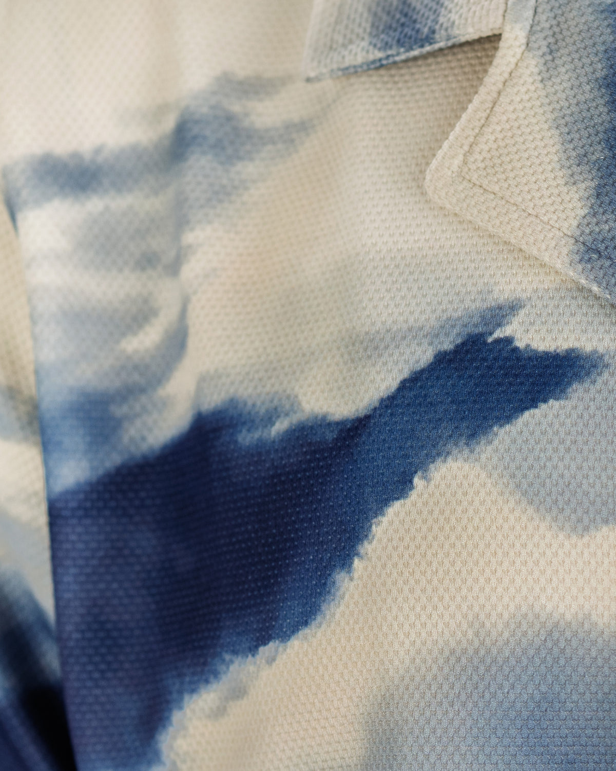 Close view of the Day Sky Print and Lunar Knit on the Riviera Shirt.