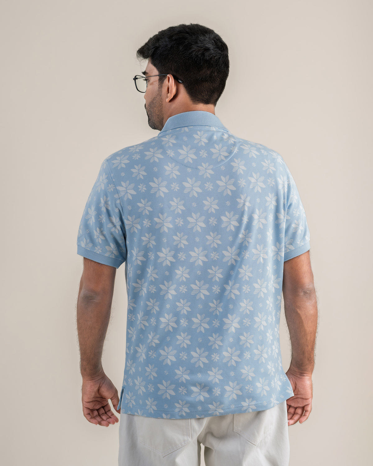 Back view of the Vela Polo in Cerulean.